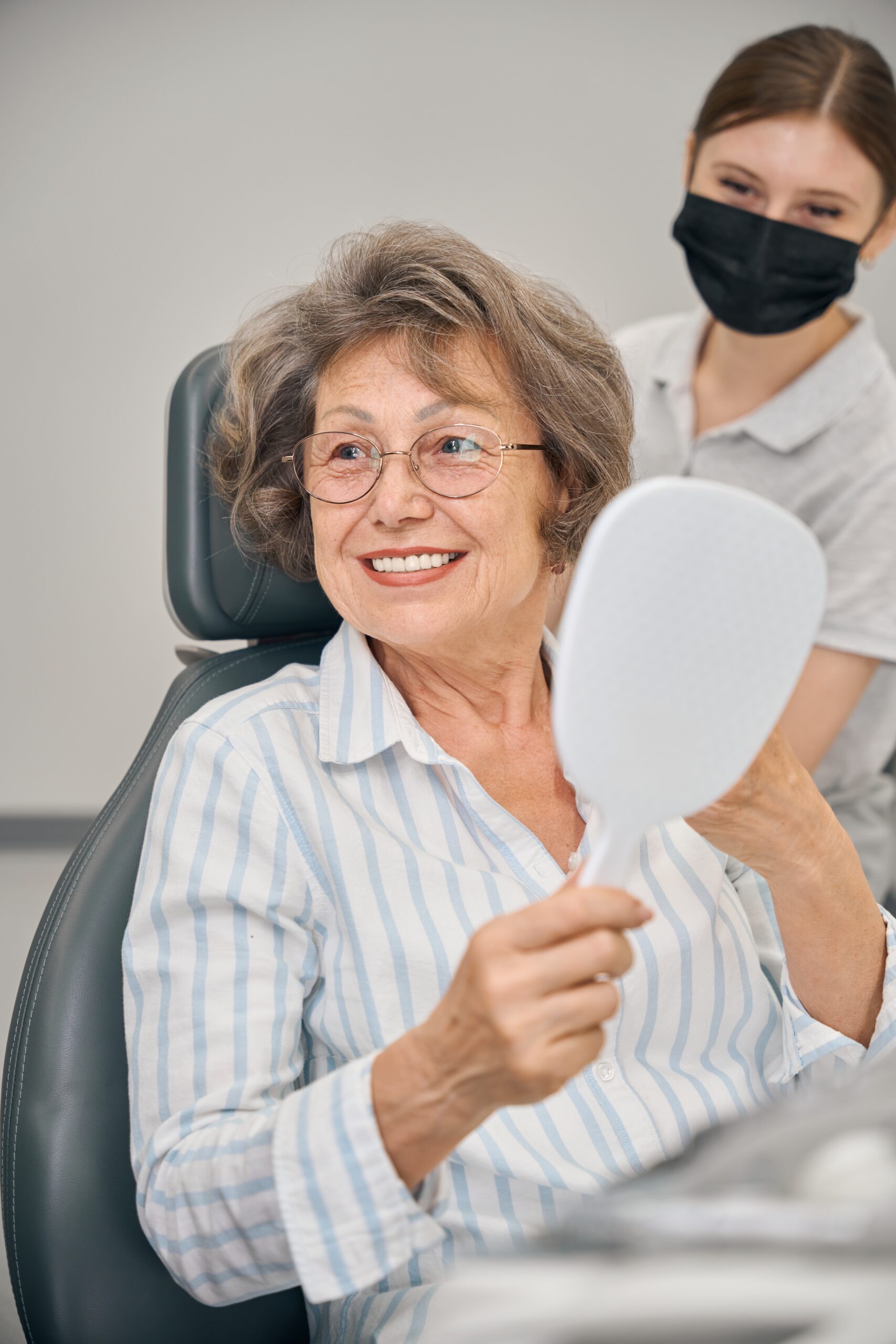 Patient smiling after cosmetic dental treatment